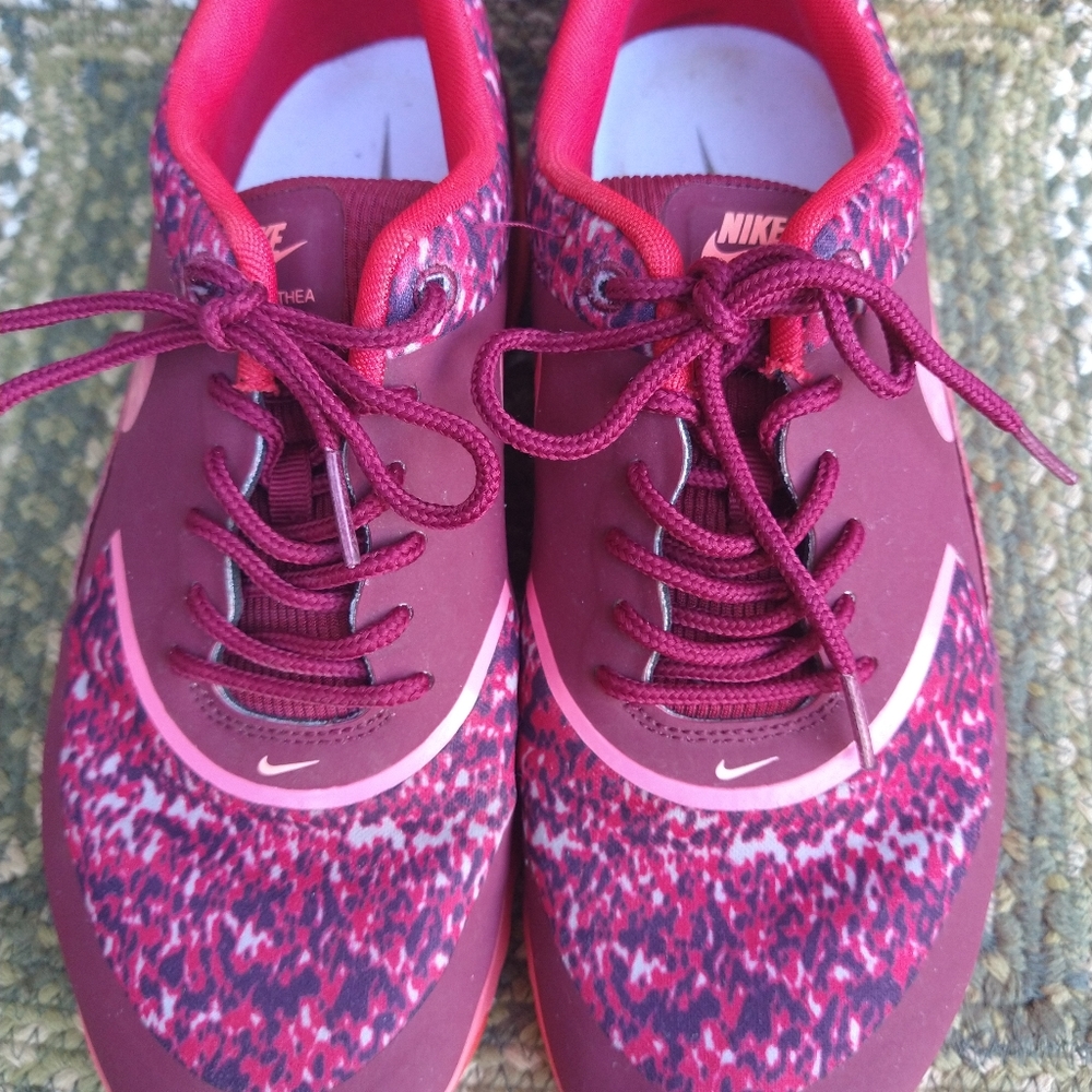 Nike size 8 1/2 red athletic shoes